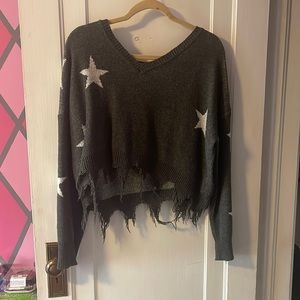 SHEIN starred sweater. No tags (unsure of size) I’d said medium.